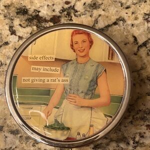 Anne Taintor pill organizer 
Never used